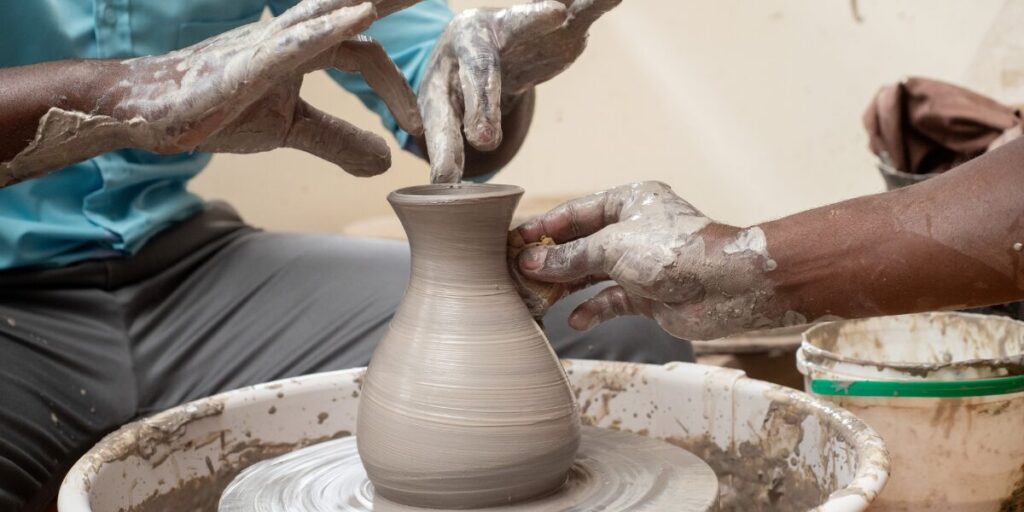 African artisans are making clay vases to sell in African markets in Australia 